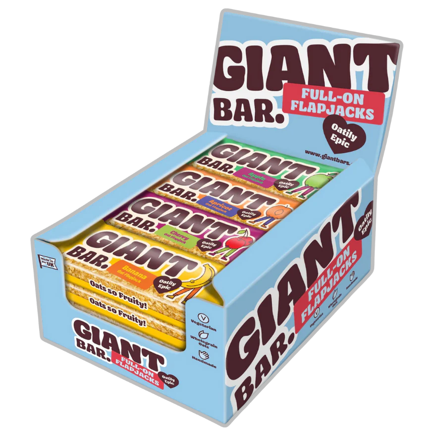 Box of Giant Bar flapjacks with various flavors on a white background