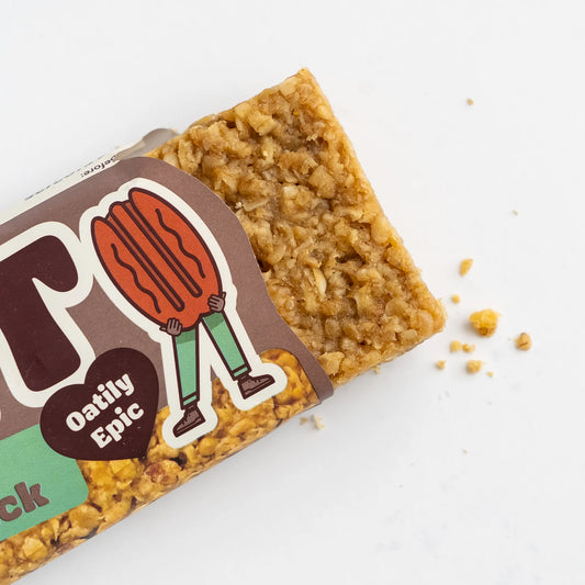Oat bar with a colorful label on a white background