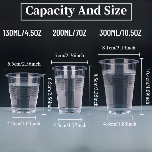 Three clear plastic cups with measurements on a black background
