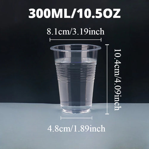 Clear plastic cup with measurements on a dark background